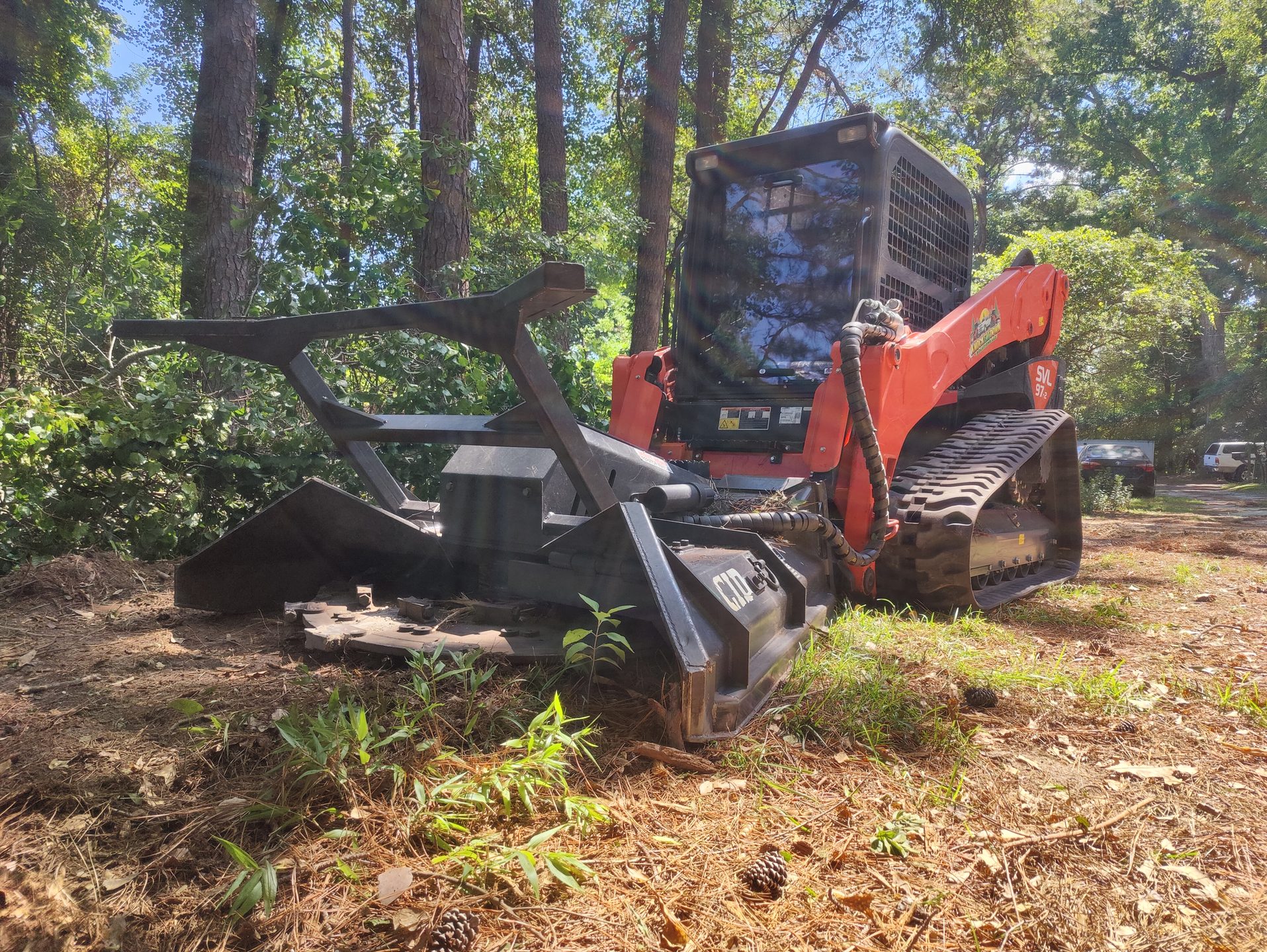 Knock'Em Down Solutions forestry mulcher clearing land near Fayetteville NC