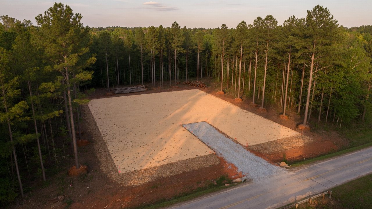 Lot and job site clearing with forestry mulching — building pad ready for construction