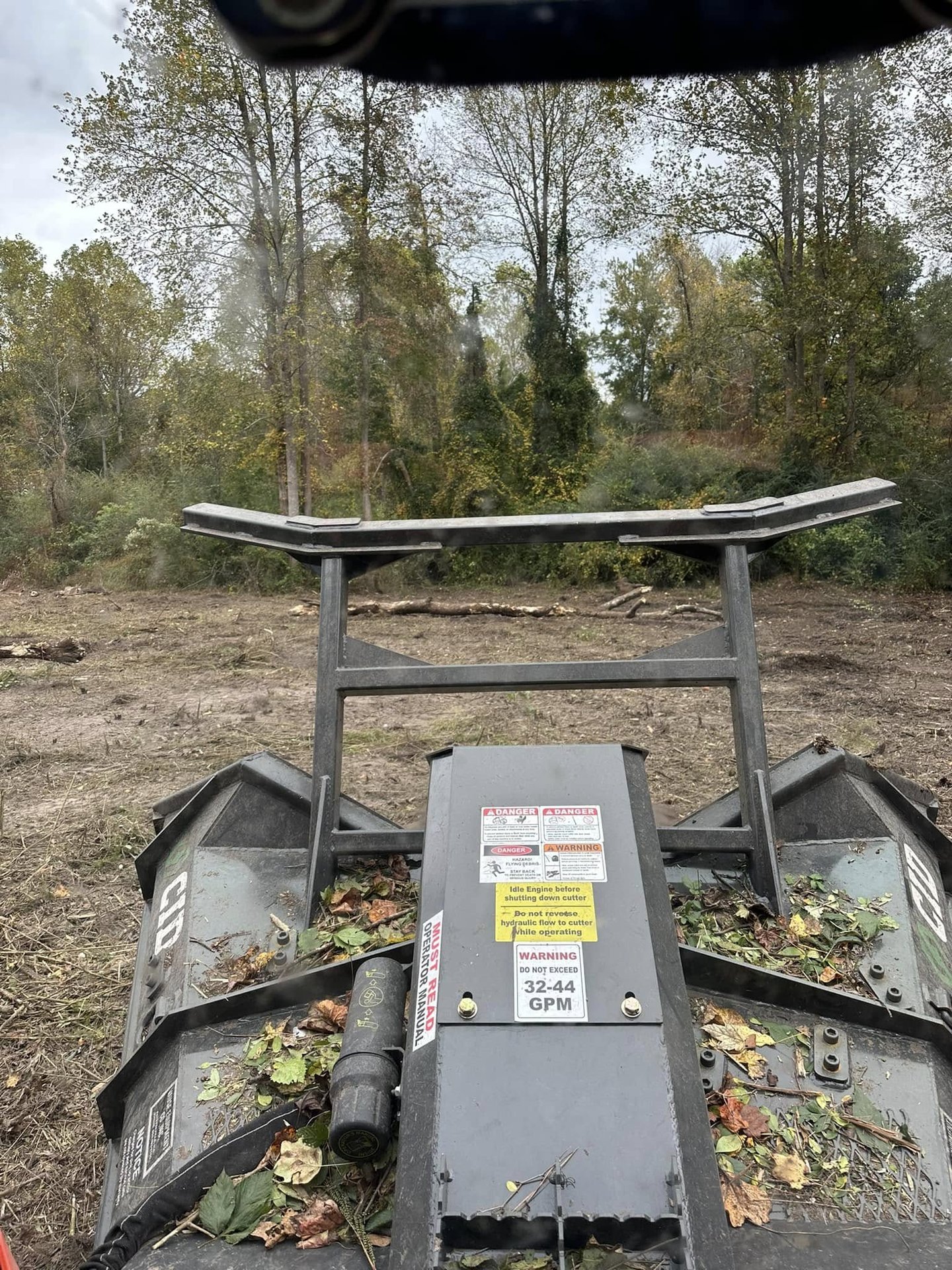 Forestry mulching machine clearing land near Fayetteville NC