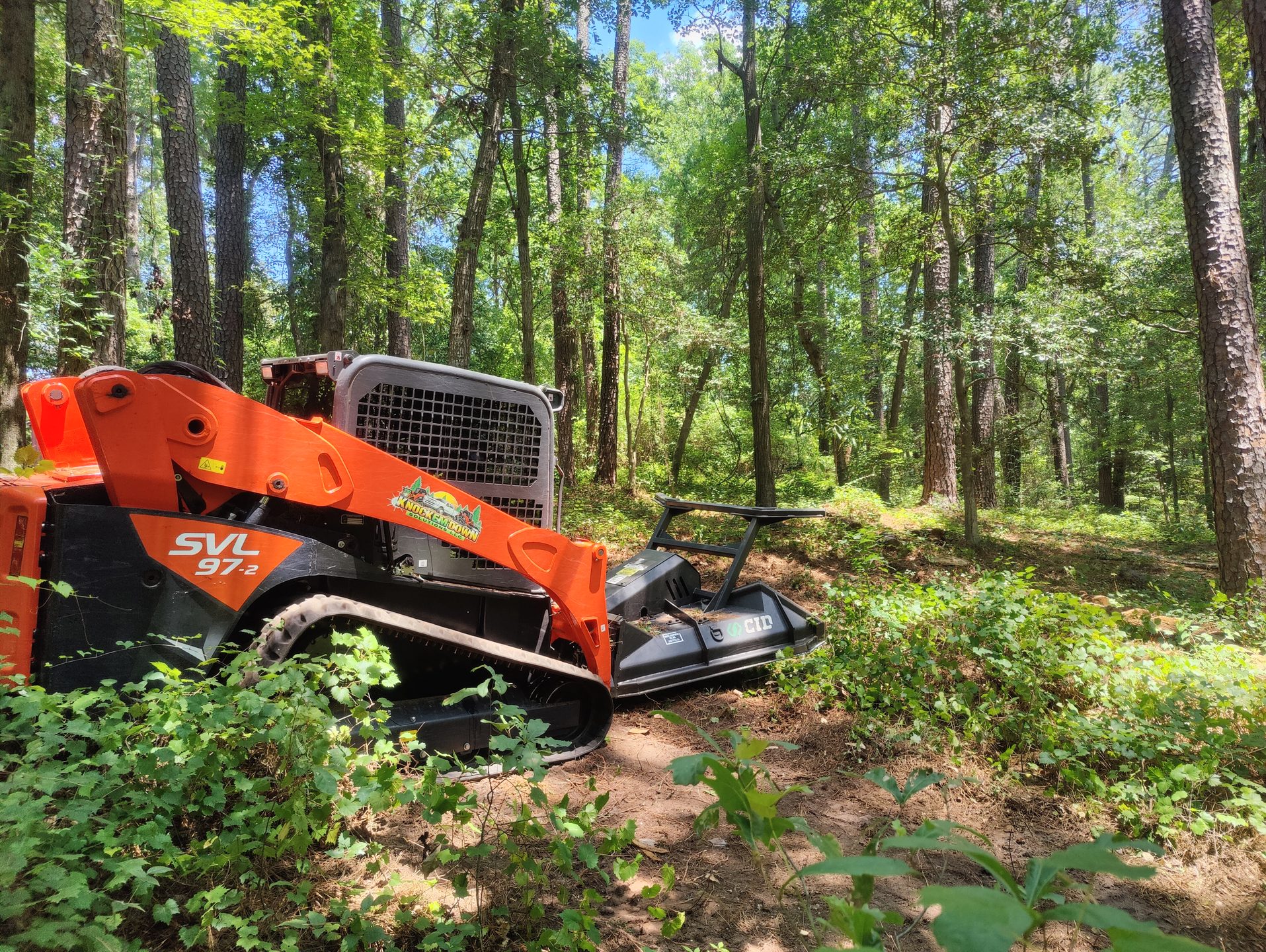 Knock'Em Down Solutions forestry mulcher on a cleared North Carolina lot